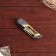 A folding semi -automatic "pescar", a 6cm blade, with a flashlight, an elephant. bone