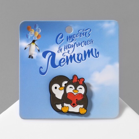 Penguin icon a couple, colored in ferrous metal