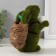 Souvenir Foam "Rabbit green with an testicle and a basket with carrots" 15x7x15.5 cm