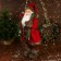 Santa Claus "with a flashlight and twigs" 60 cm, red