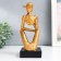 Polystone souvenir "Man in the cap. Reflections" gold 12x9x23 cm