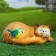 Garden figure "Sleeping cat with a bird" 13x29cm