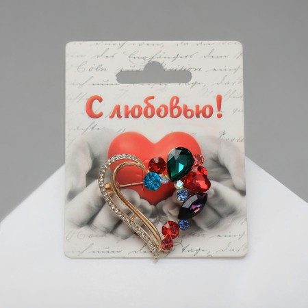 Brooch "Heart" in stones, colored in gold