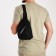 Male sling bag from textiles, headphone opening, black color