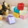 Gift box under the pearl ring with a bow, 4 × 4, the color of Mick