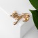 Brooch "cat", white color in gold