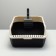 A high side toilet with a scoop and a filter, 50 x 36 x 21 cm, black