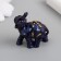 Polystone souvenir "Blue-violet elephant with a blanket and gold" 4x2x4 cm