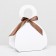 The box is folding, with a bow and a pen, white, 18 x 12 x 8 cm