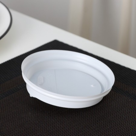 A plastic disposable lid for a white glass, with a valve, d = 9 cm-3