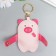 A keychain to the leatherette with a pink pig pocket 9x5.7 cm