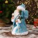 Santa Claus "In a blue fur coat with gifts" moves, with backlight, 30 cm