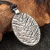Scarabian amulet with a carbonic stone, 30x47 mm, metallic