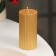 Candle-cylinder with faces, 5x10cm, gold, 6 hours
