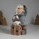 Souvenir Ceramics Light "Baby in a gray coat, with a penguin on the gift" 12x6.5x20 cm