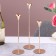 A set of 3 candlesticks, metal, h = 31.5/26.5/21.5 cm
