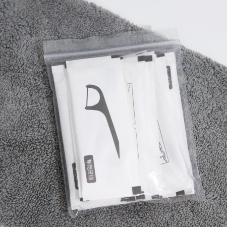 Tooth thread in a plastic holder, individual packaging, involuntary, set of 15 pcs.