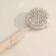 Massage brush for the body of the share, with a strap, natural bristles
