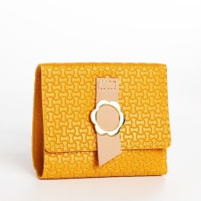 Women's wallet on the button, yellow color