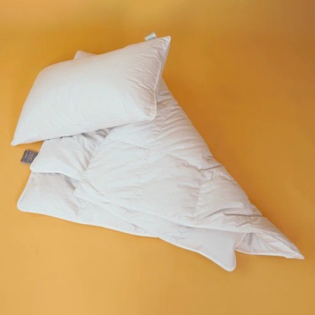 Baby pillow is low, size 40x60 cm, color mix