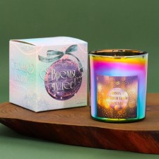 New Year's candle in a glass 