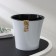 Kashpo for flowers with the insert "Art", 1.2 l, the color is white-black
