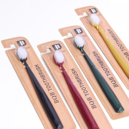 A toothbrush with a wide cleaning head and super -tank bristles, Japanese style, mix-1