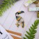 Brooch "Tukan" tropical, colored in gold