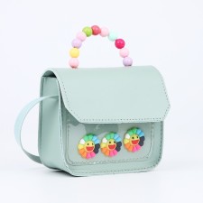 Baby bag on a magnet, the color is light turquoise