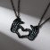 A pendant on a chain of "sin" 9 x 12.4 cm