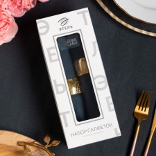 A set of napkins with a decorative. Rings 