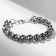 Bracelet of the male "brutal" skulls, color black silver, 22 cm