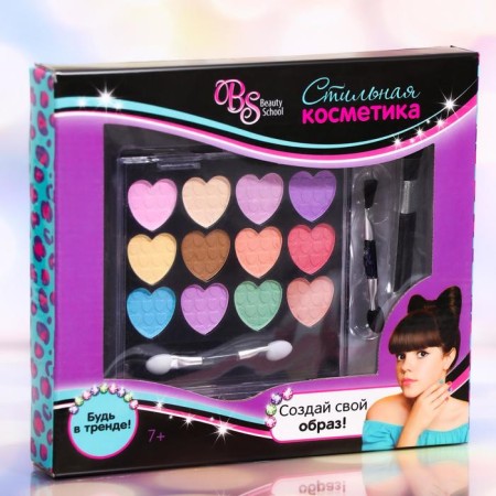 Cosmetics set for girls: shadows, brush, applicator