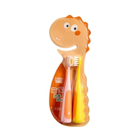 A set of children's toothbrushes dinosaurus, pink and yellow