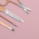 Manicure set, 8 objects, in case, beige/pink gold color
