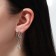 Hanging earrings with rhinestones “Star” with a spiral, white color in silver, 6.5 cm