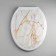 The toilet seat with the Rossplast lid "Decor. White marble ”, 44 x 36 cm, white color