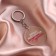 Acrylic keychain with a joke "is difficult to be modest", diam. 4.5 cm