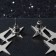 Metal earrings "Three stars", silver color