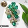 Brooch "Flower Vine", emerald color in black gold