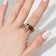 The ring with the inscription "Happiness is", the color is gold, dimensionless