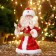 Santa Claus "in a red fur coat and a header with a pearl" 29 cm, moves