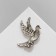Brooch "Bird" fluttering, white color in silver
