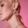 Earrings with rhinestones "flash" oval in the leaves, white color in silver