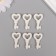 Decor for creativity Polystone "Key with heart" White set 6 pcs 2x3 cm