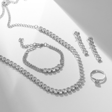 Set 4 objects: earrings, necklaces, bracelet, ovala ovals ring, white color in silver