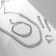 Set 4 objects: earrings, necklaces, bracelet, ovala ovals ring, white color in silver