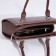 Women's bag El Masta with a zipper, outer pocket, long belt, coffee