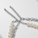 Moloderic "bead" waterfall, white in silver