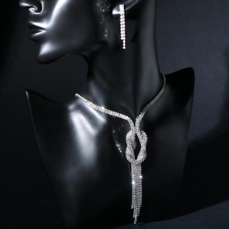 Set 2 objects: earrings, necklace "ice" bend, white color in silver, 40cm